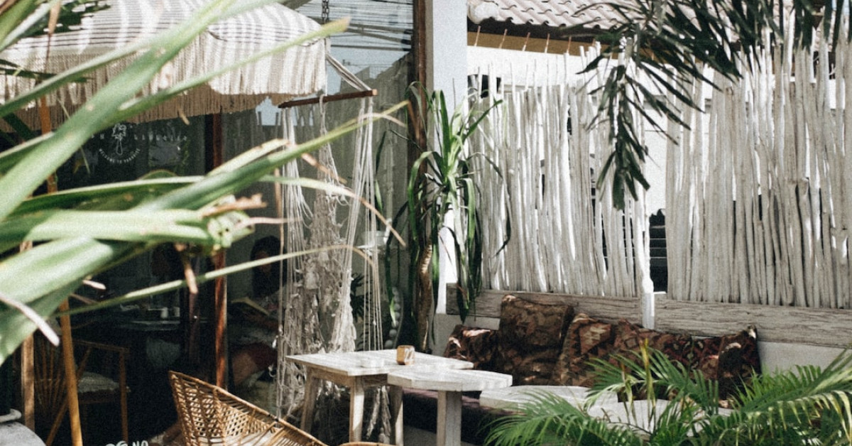Romantic evening setup with candles and flowers for two.