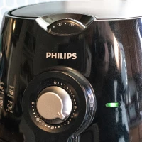 Crispy McCain Smiles in air fryer - golden and delicious. Crispy McCain Smiles in air fryer - golden and delicious.