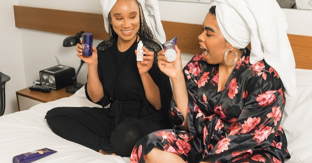 Applying tanning lotion for a perfect sun-kissed glow.