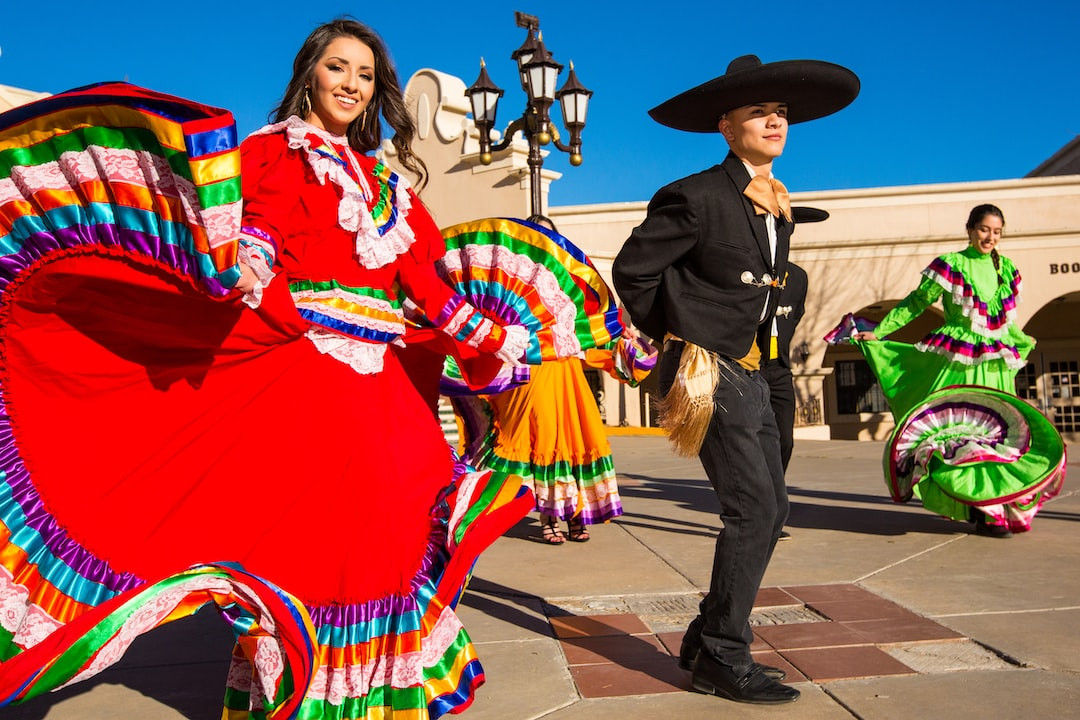 Authentic Mexican dishes displayed on a vibrant colorful table.