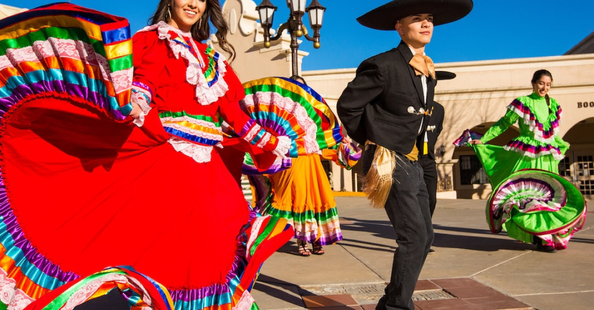 Authentic Mexican dishes displayed on a vibrant colorful table.