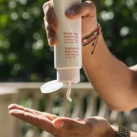 Bottle of Awestruck Tanning Lotion for Summer Tan Enhancement. Bottle of Awestruck Tanning Lotion for Summer Tan Enhancement.