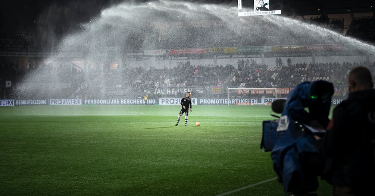 Barstool Sports 20th anniversary logo with celebratory background.
