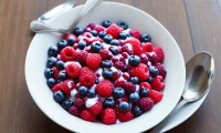 Bowl of fresh mixed berries top view