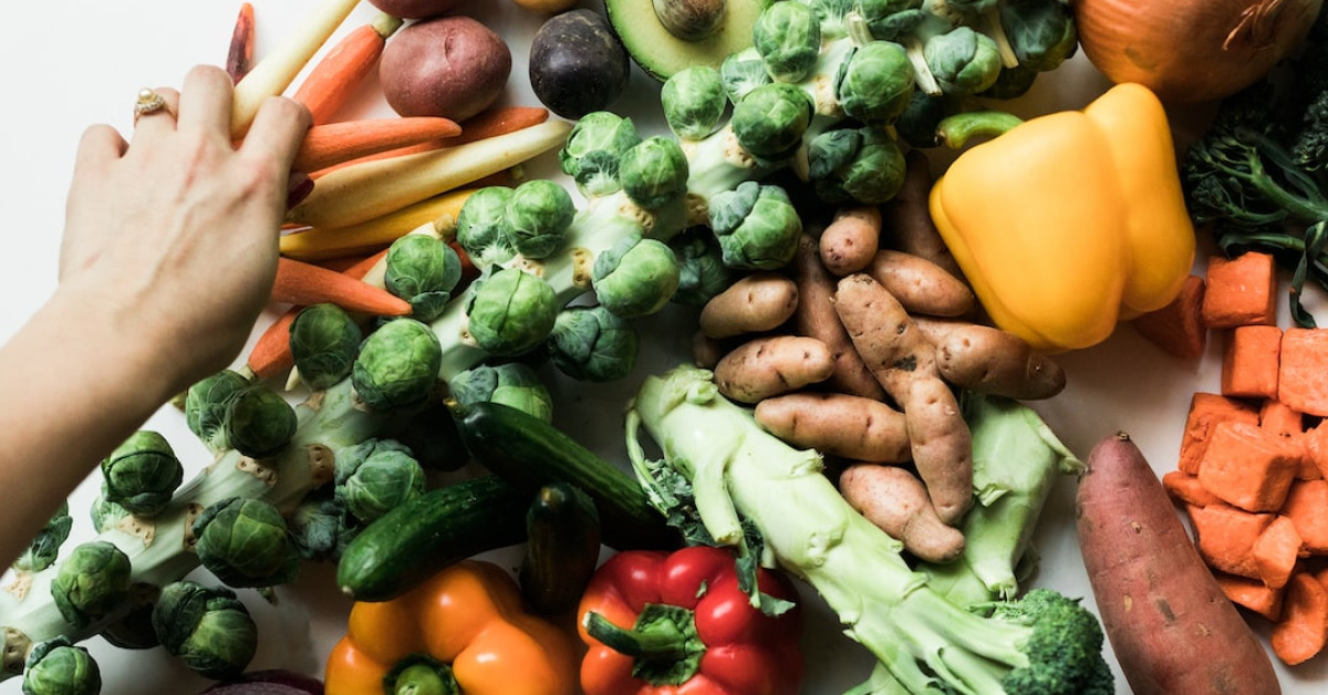 Broccoli soaking in hot water depicting trendy healthy eating concept.