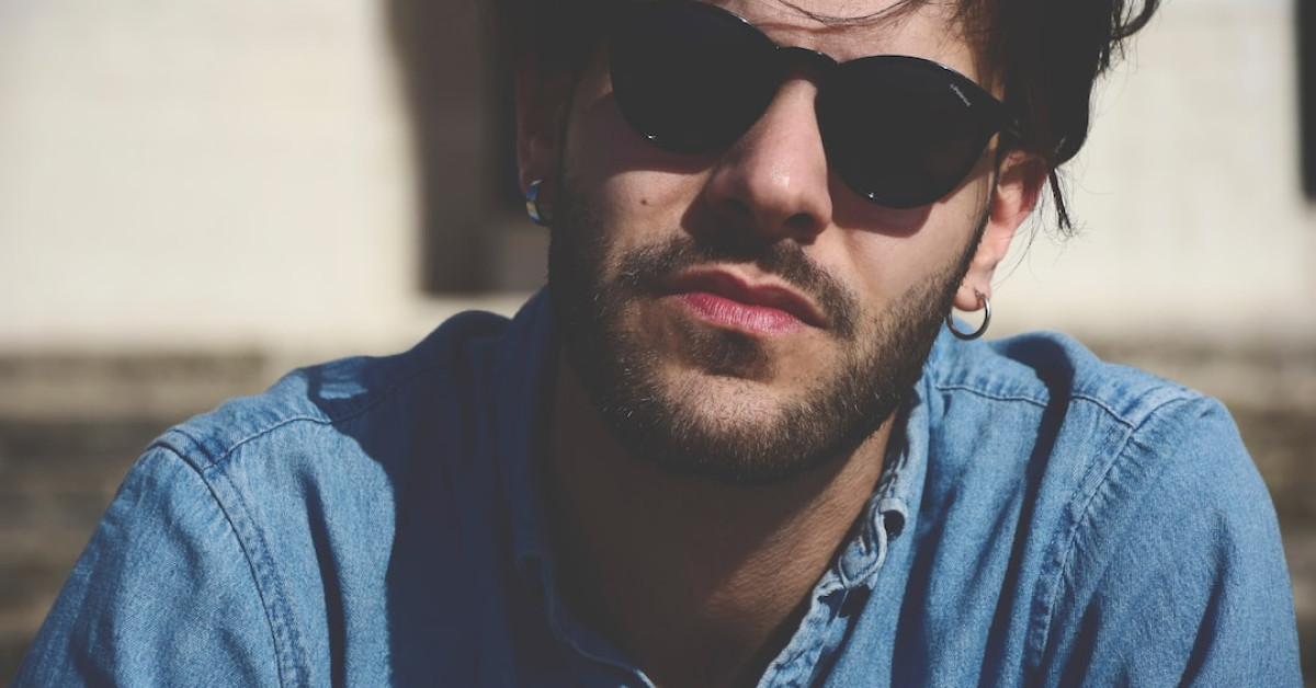 Fresh broccoli on soil illustrating its agricultural origins.