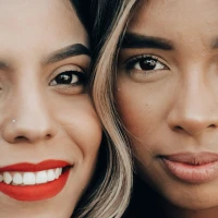 Two joyful friends hugging with inspirational best friend quotes. Two joyful friends hugging with inspirational best friend quotes.