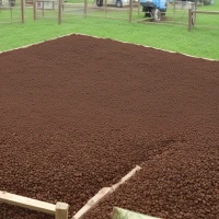 Coffee grounds scattered in chicken coop for sustainability. Coffee grounds scattered in chicken coop for sustainability.