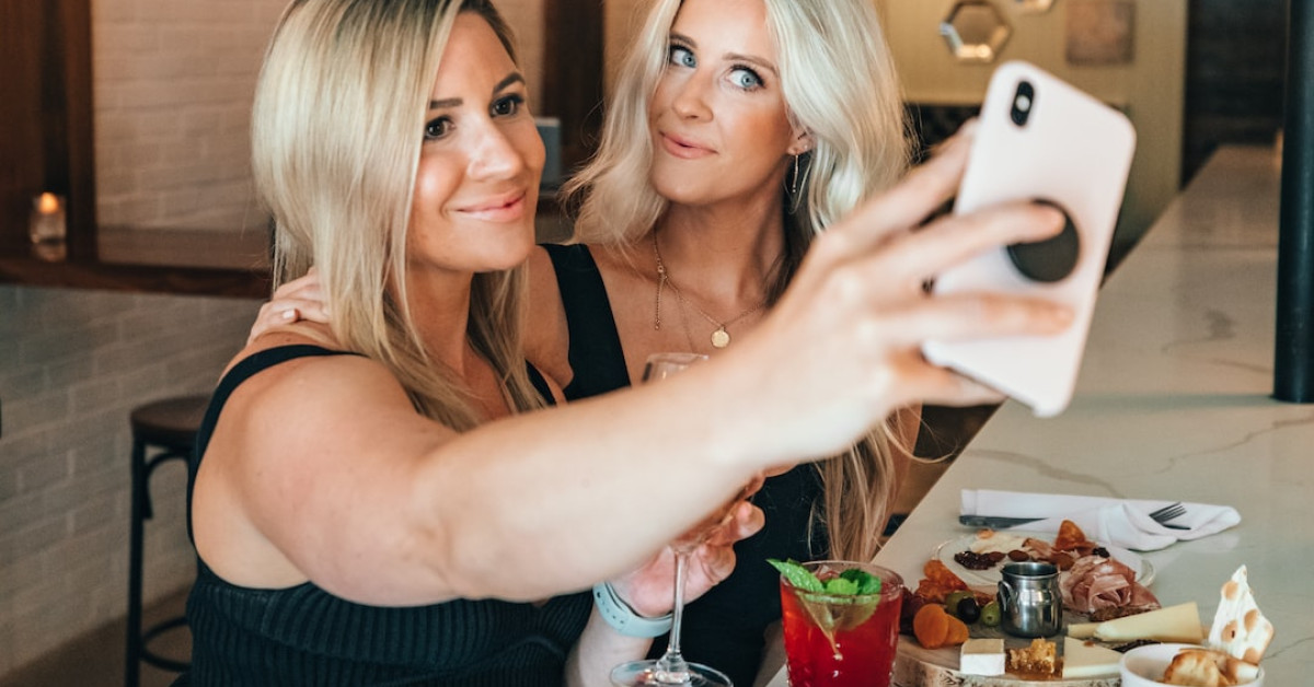 Salomon X Ultra 4 GTX hiking boots on mountain path.