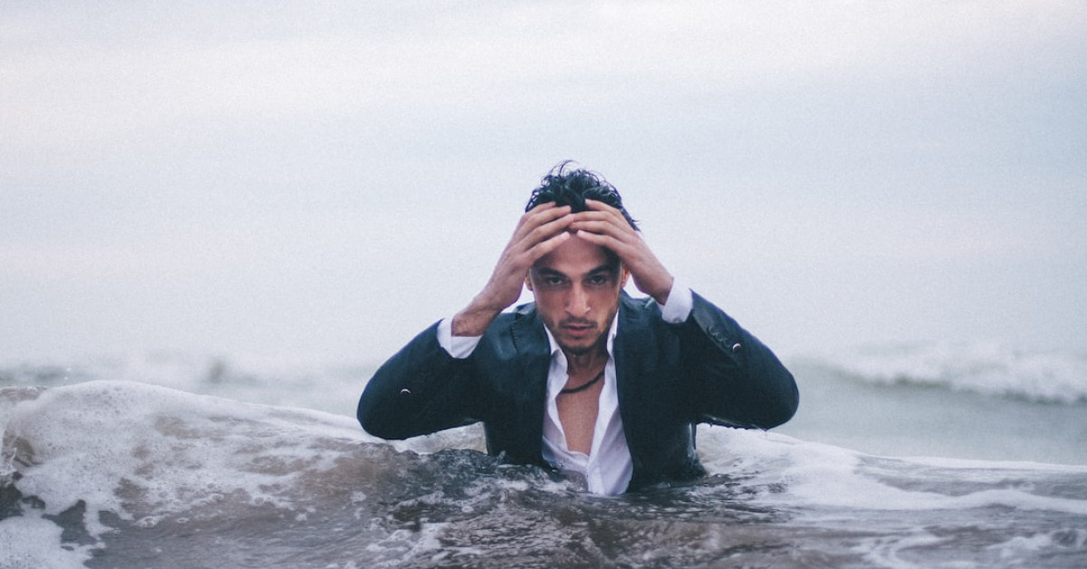 Timberland anti-fatigue hiking boots on rugged forest trail.