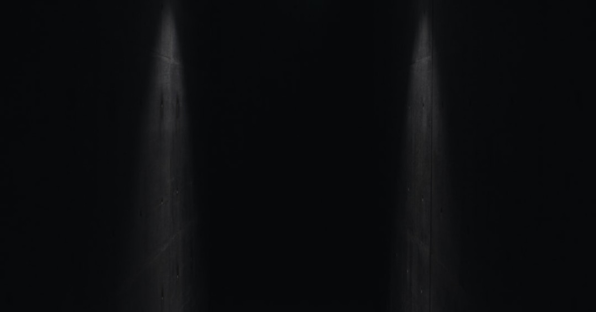 Cave diver exploring underwater passageway in a suspenseful movie scene.