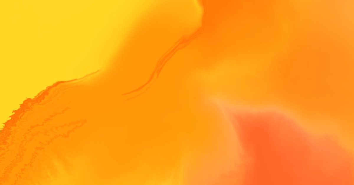 Orange Pyrex bowls collection on wooden surface