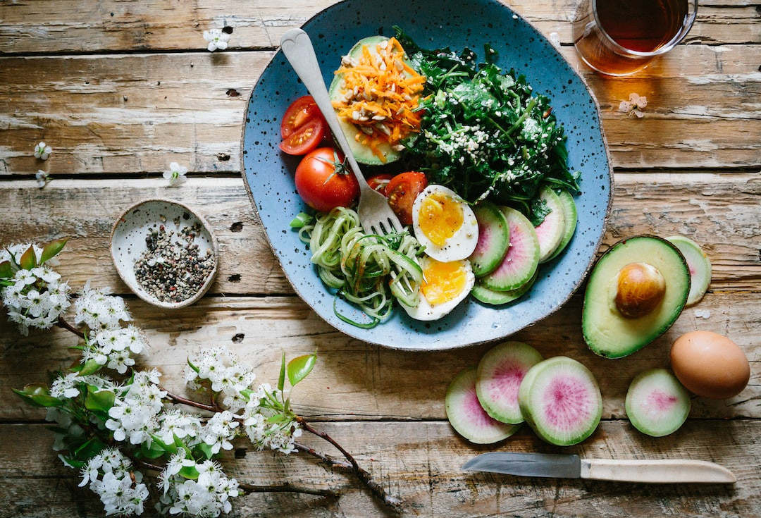 Assorted fresh Costco salad bowls on a table.