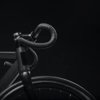 Cyclist applying grease for smooth bike maintenance. Cyclist applying grease for smooth bike maintenance.