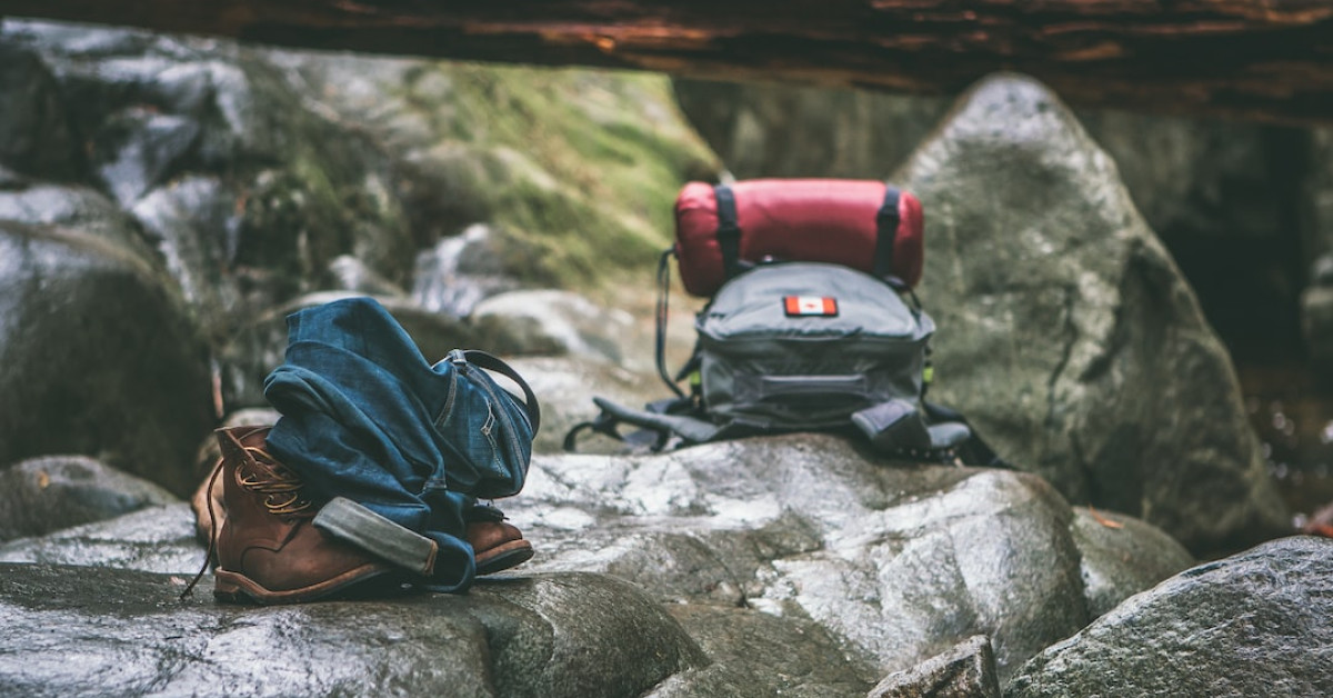 Chacos hiking sandals on rocky trail outdoors.