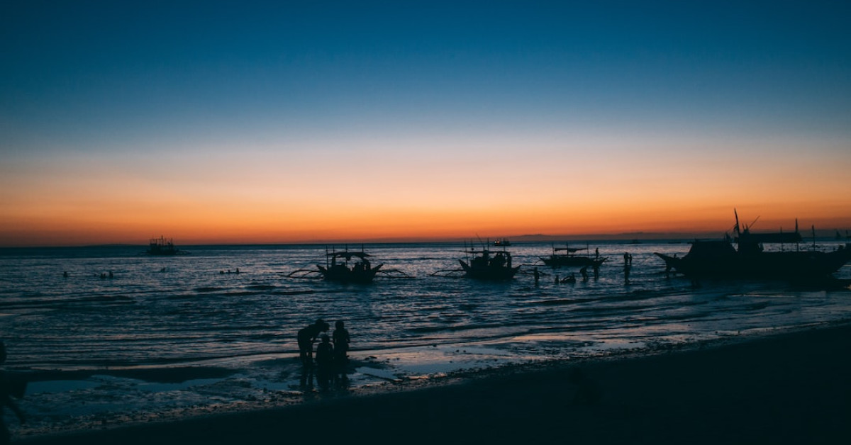 Person enjoying helmet diving underwater in Boracay.