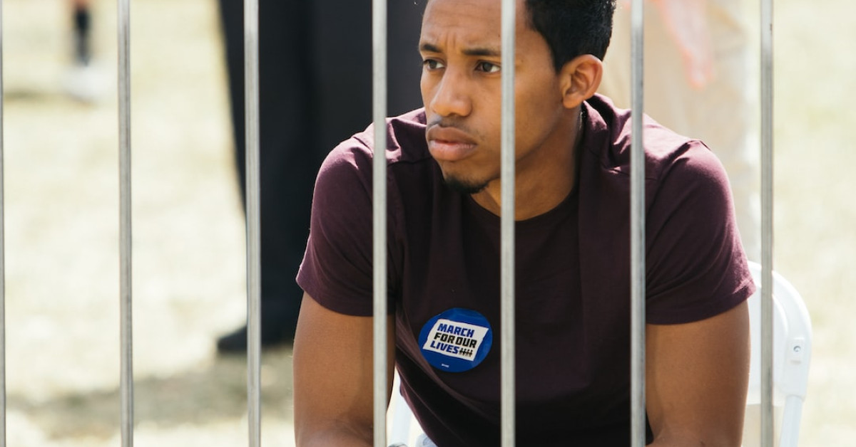 Army diver receiving prestigious diving badge underwater.