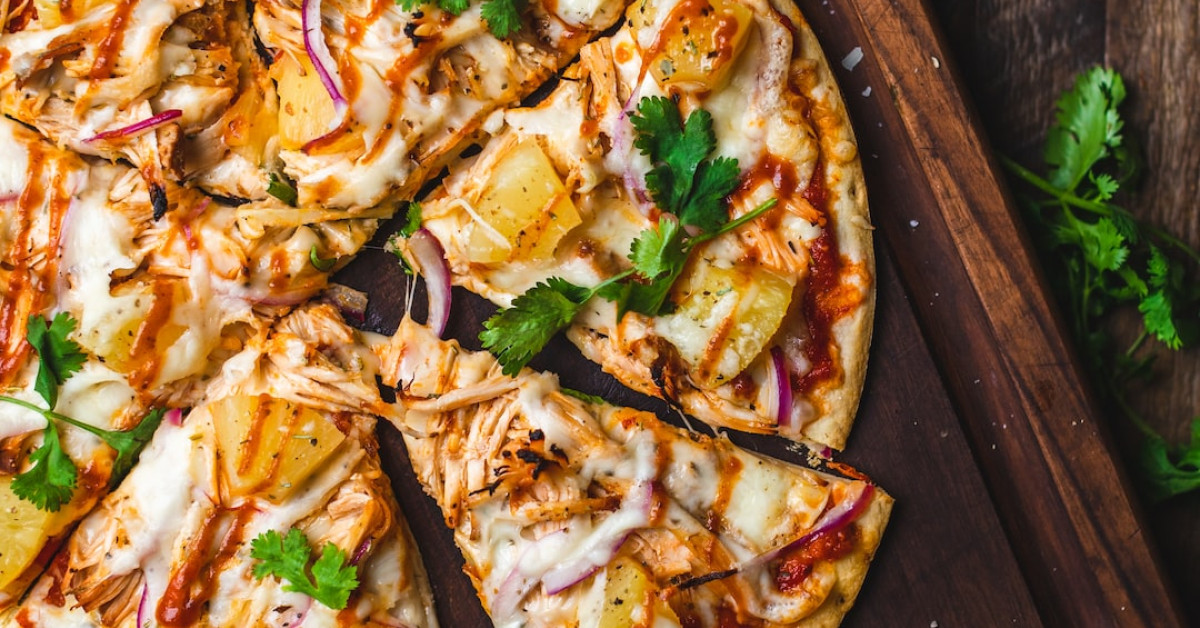 Delicious pizza topped with cottage cheese in a bowl.