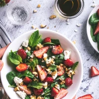 Elegant Crate & Barrel salad bowls for upscale dining.