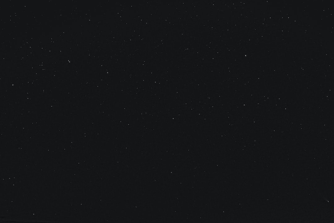 Black Diamond hiking pole tip protectors on ground.