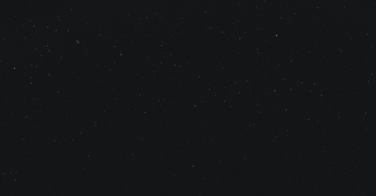 Black Diamond hiking pole tip protectors on ground.