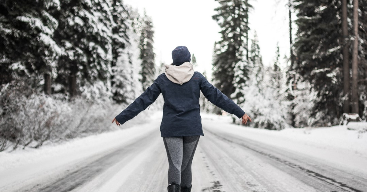 Cascade trekking poles on mountain trail for hiking support.