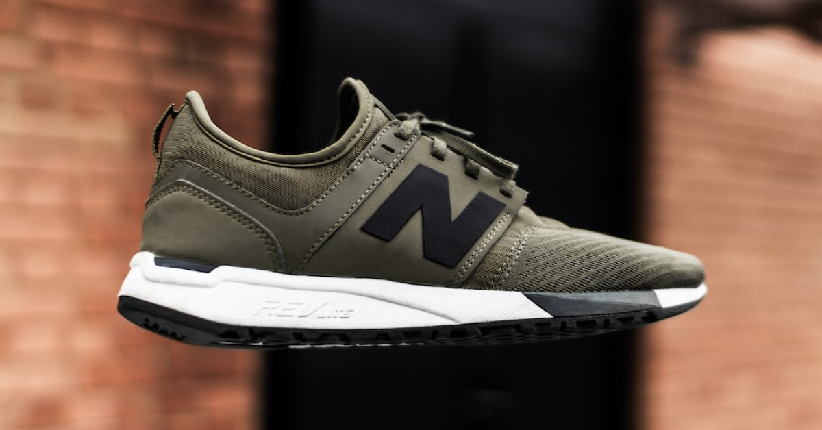 KEEN Basin Ridge waterproof hiking shoes on rocky terrain.