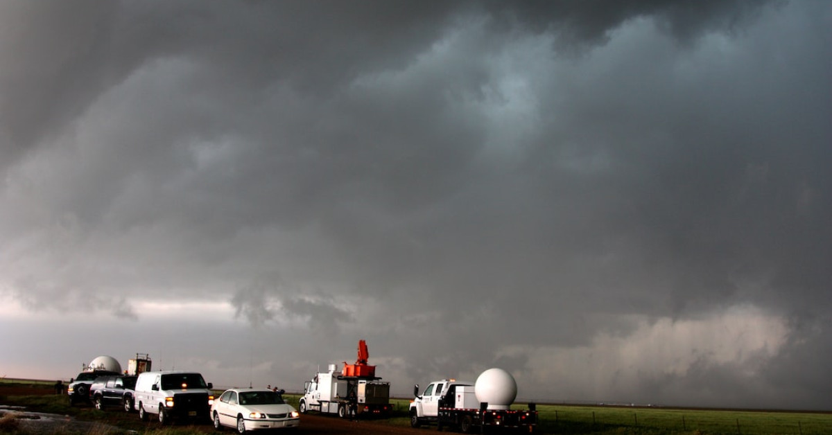 Local Crosslake coffee cup amidst warm, cozy café ambiance.