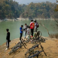 Person cycling in nature for health and transformation. Person cycling in nature for health and transformation.
