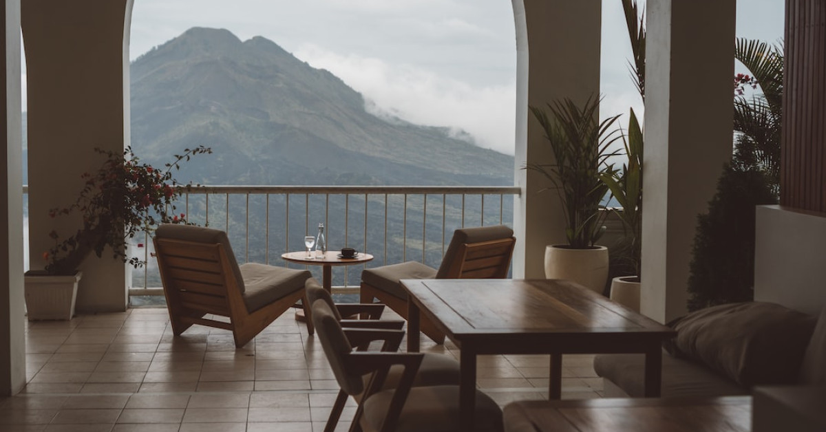Balcony room view on Carnival Cruise promoting serene experience.