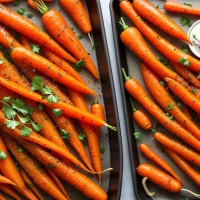 Spicy harissa glazed carrots on plate Spicy harissa glazed carrots on plate