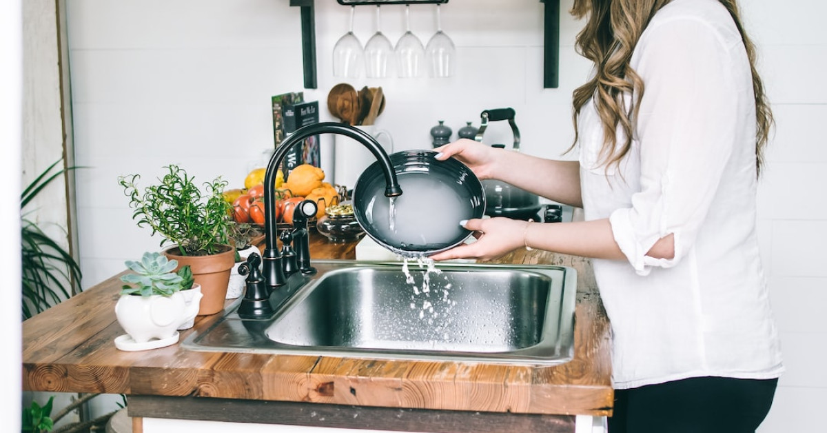 Pan-seared swordfish with fresh vegetables on plate.