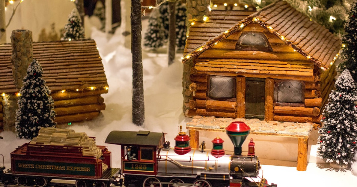 Homemade sticky gingerbread on plate with aromatic spices.