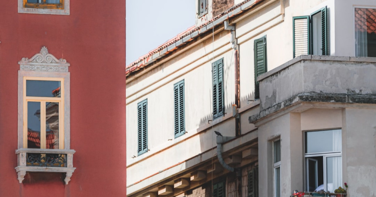 Oven-roasted chicken breast with vegetables on a plate.