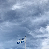Hiker with LEKI poles on scenic mountain trail. Hiker with LEKI poles on scenic mountain trail.
