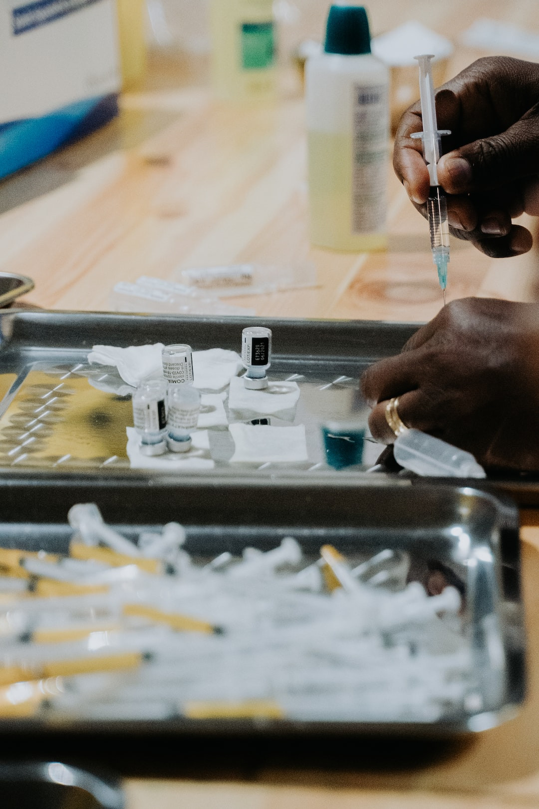 Cyclist inflating tire with presta valve for efficient riding.