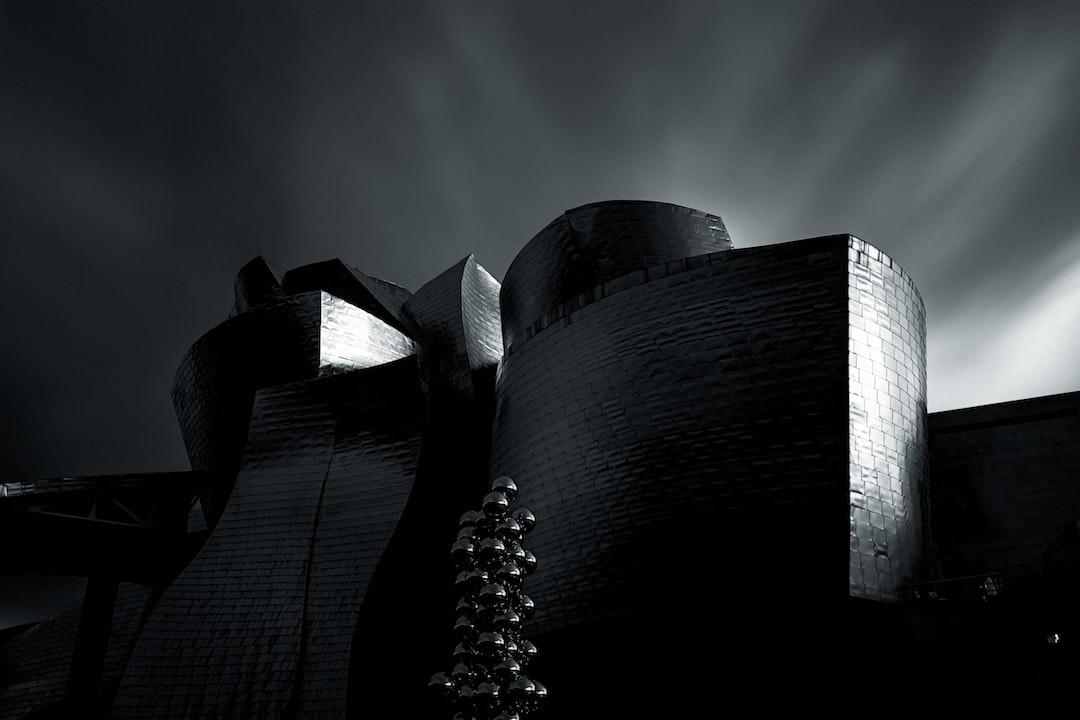 Miles William Guggenheim, Elisabeth Shue's son, smiling outdoors.