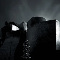 Miles William Guggenheim, Elisabeth Shue's son, smiling outdoors. Miles William Guggenheim, Elisabeth Shue's son, smiling outdoors.