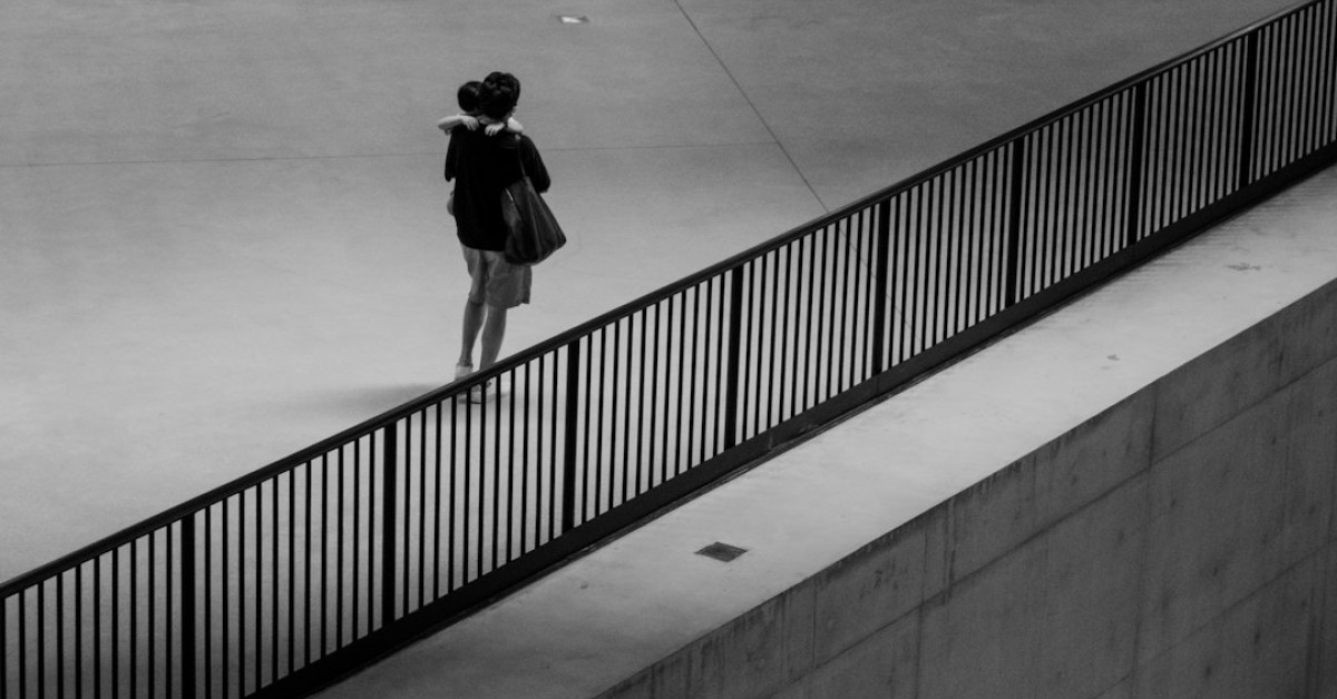Colorful sugar cookies with vegetable decorations on a plate.