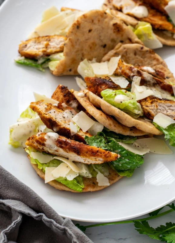 Naan vs Pita bread comparison on wooden board