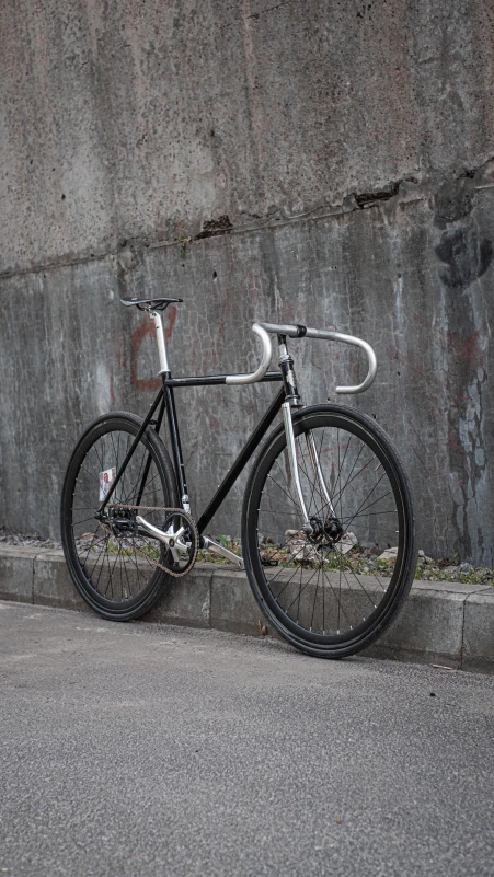 Urban cyclist riding a Pure Fix bicycle through the city.
