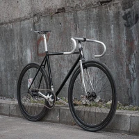 Urban cyclist riding a Pure Fix bicycle through the city. Urban cyclist riding a Pure Fix bicycle through the city.