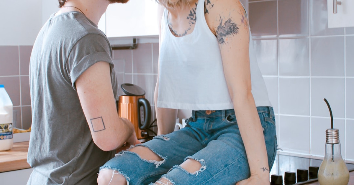 Couple celebrating 25th wedding anniversary with a toast.