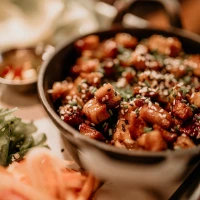 Teriyaki bowl with fresh vegetables and succulent chicken. Teriyaki bowl with fresh vegetables and succulent chicken.
