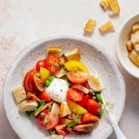 Tasty Taco Salad Bowl with Fresh Ingredients on Table. Tasty Taco Salad Bowl with Fresh Ingredients on Table.