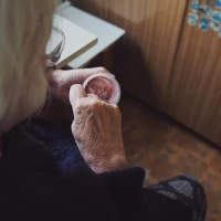 Fresh yogurt-infused naan on wooden board. Fresh yogurt-infused naan on wooden board.
