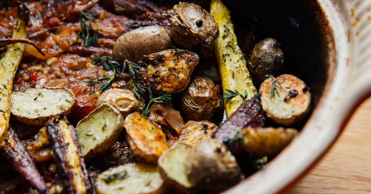 Slow-cooked roast with onion soup in a crockpot.