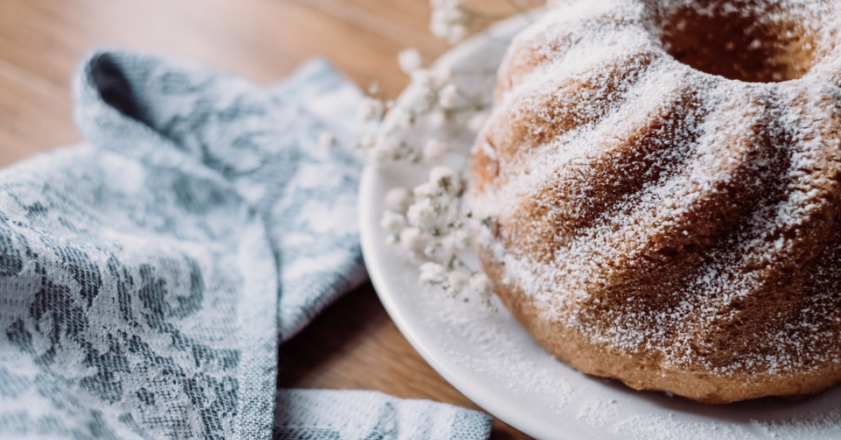 Lemon pound cake topped with fresh strawberries.
