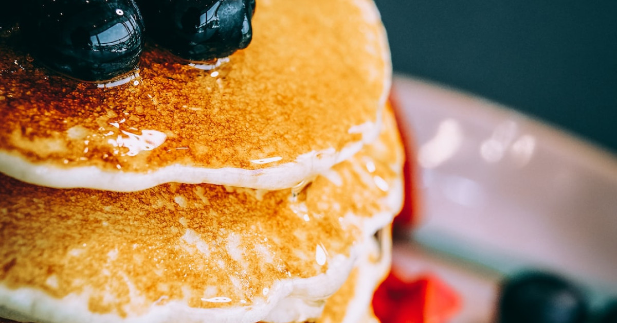 Blueberry crumb cake with vegetable ingredients on a plate.