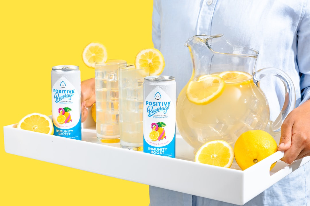 Healthy agave lemonade with vegetable infusion in a glass.